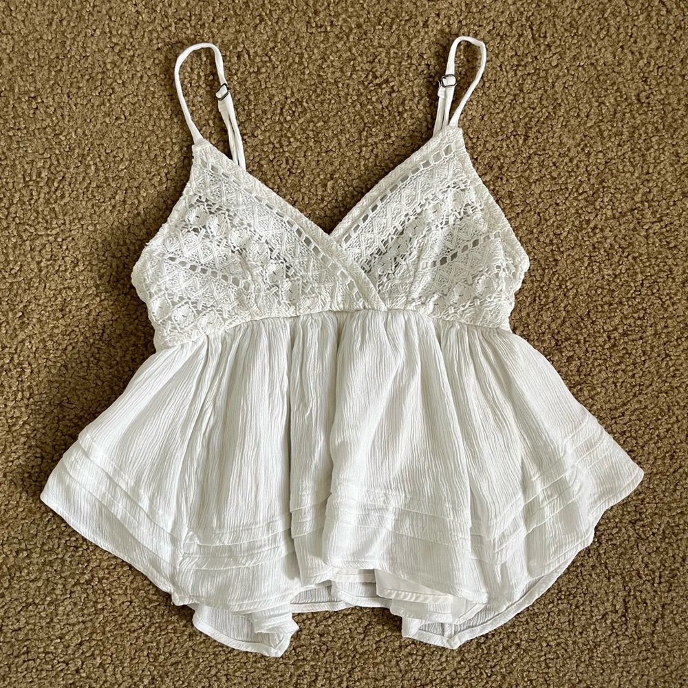 Flowy White Boho Top with Knit Detail and Layered Bottom Look